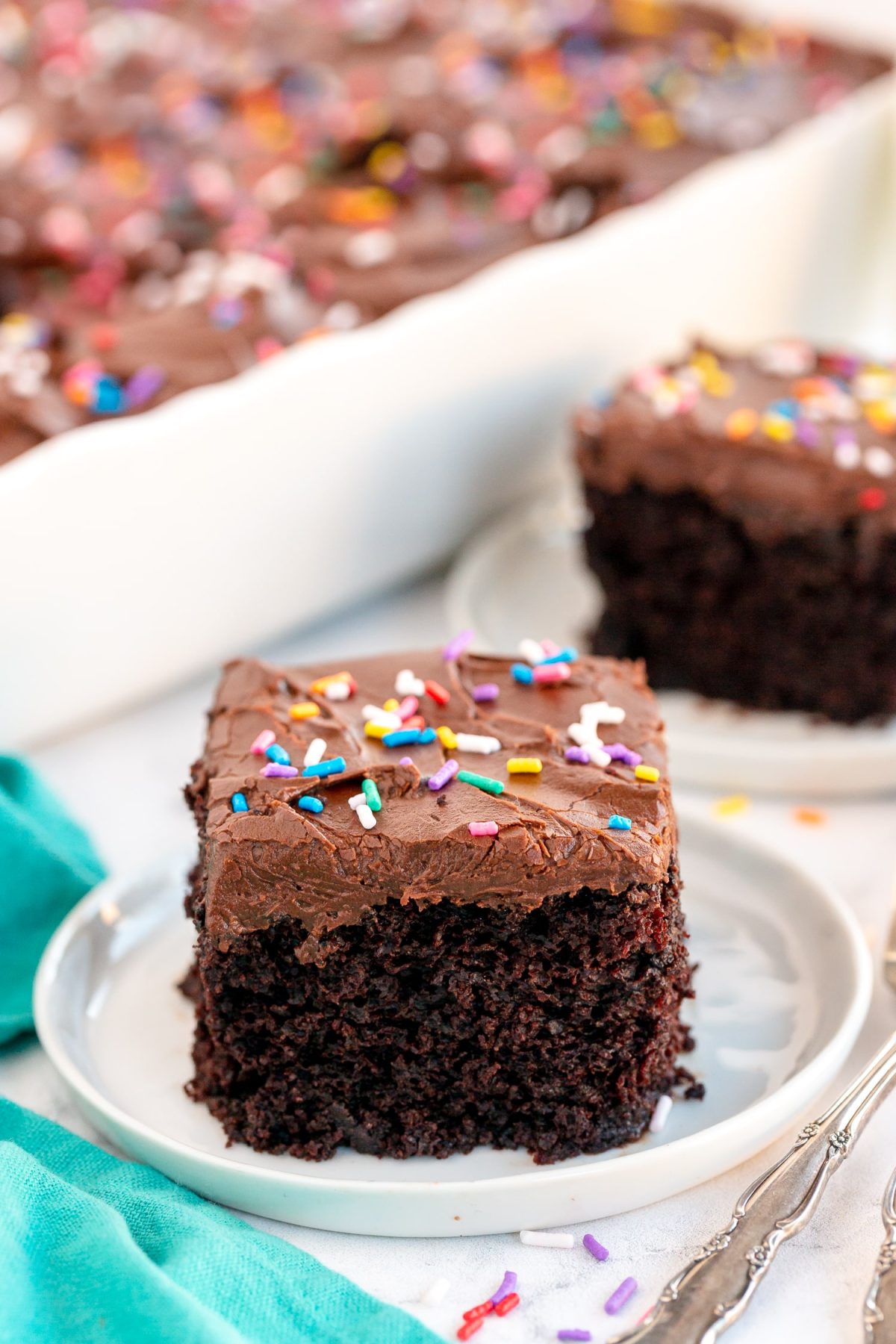 slice of chocolate cake on white plate